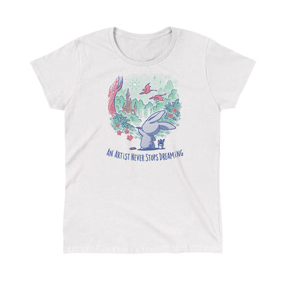 Classic Cotton T-shirt_TeeTurtle An Artist Never Stops Dreaming white t-shirt featuring a bunny painting a whimsical landscape with a castle, trees, and flying creature.