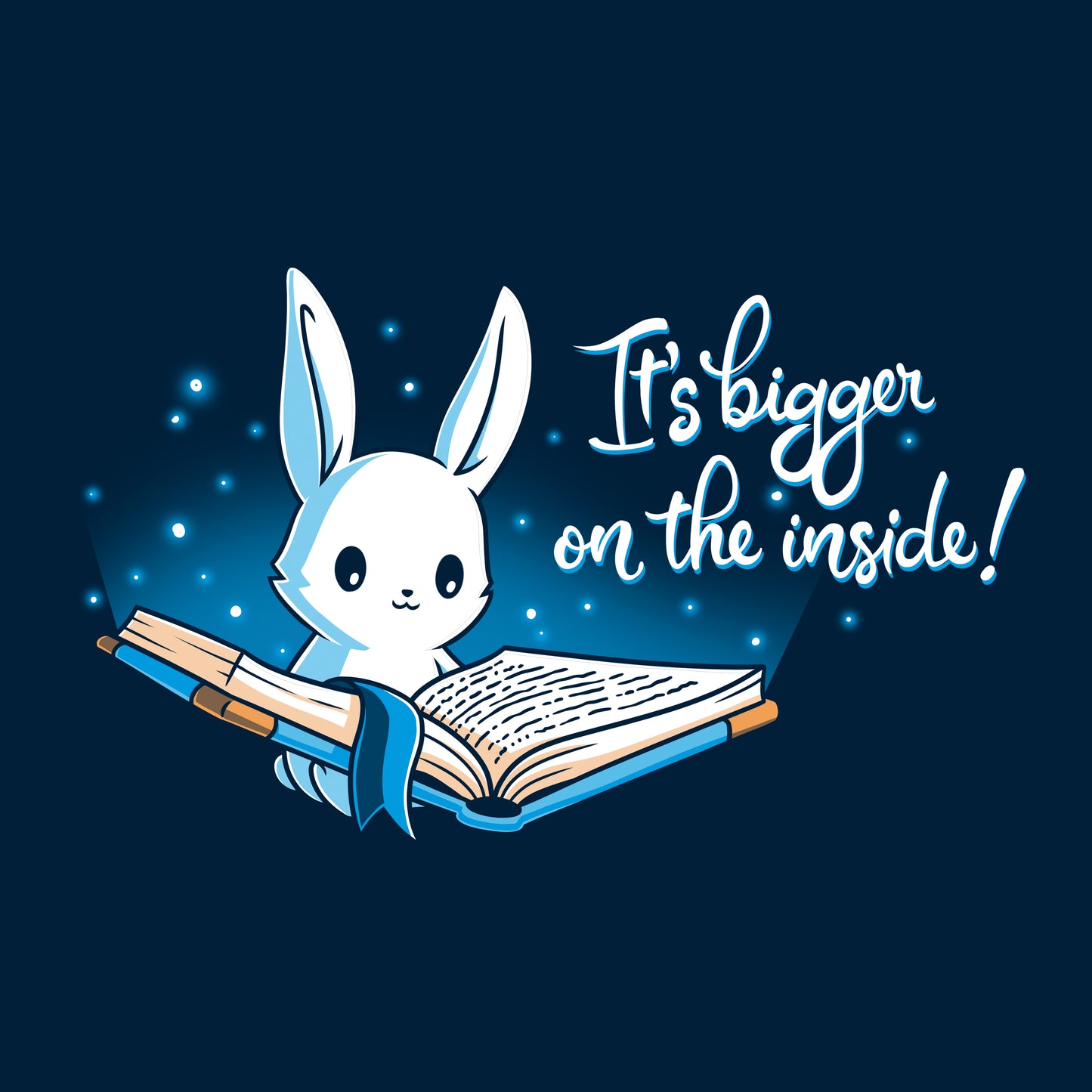 Classic Cotton T-shirt_Teeturtle Books are Bigger on the Inside Navy Blue t-shirt featuring a white rabbit reading a book from which light and sparkles are coming out with a blue ribbon bookmark marking the page with the text "It's bigger on the inside!" written next to it.