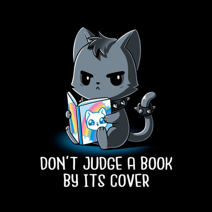 Classic Cotton T-shirt_TeeTurtle Don't Judge a Book By It's Cover black t-shirt featuring seemingly grumpy, goth-looking cat wearing a spiked collar and spiked ring on its tail reading a bright, happy-looking rainbow-covered book above the text 'Don't Judge A Book By Its Cover.'