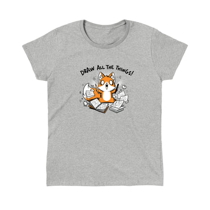 Classic Cotton T-shirt_A cartoon fox enthusiastically holding drawing tools, surrounded by sketchbooks with various drawings. Text above reads "Draw All The Things!" This monsterdigital original Draw all the Things! is crafted from super soft ringspun cotton for ultimate comfort.