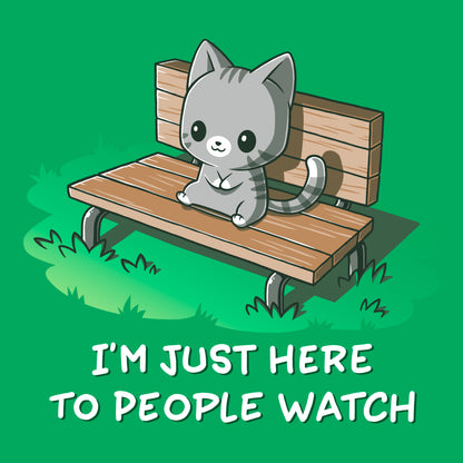 Classic Cotton T-shirt_TeeTurtle I'm Just Here to People Watch Irish green t-shirt featuring an illustration of a cute gray cartoon cat sitting on a bench in the grass, accompanied by the text "I'M JUST HERE TO PEOPLE WATCH" written below. 