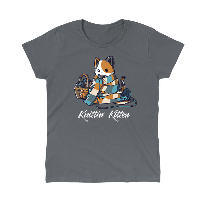 Classic Cotton T-shirt_TeeTurtle Knittin' Kitten charcoal gray t-shirt featuring a calico cat knitting a long scarf that’s wrapped around it with a basket of yarn next to it.