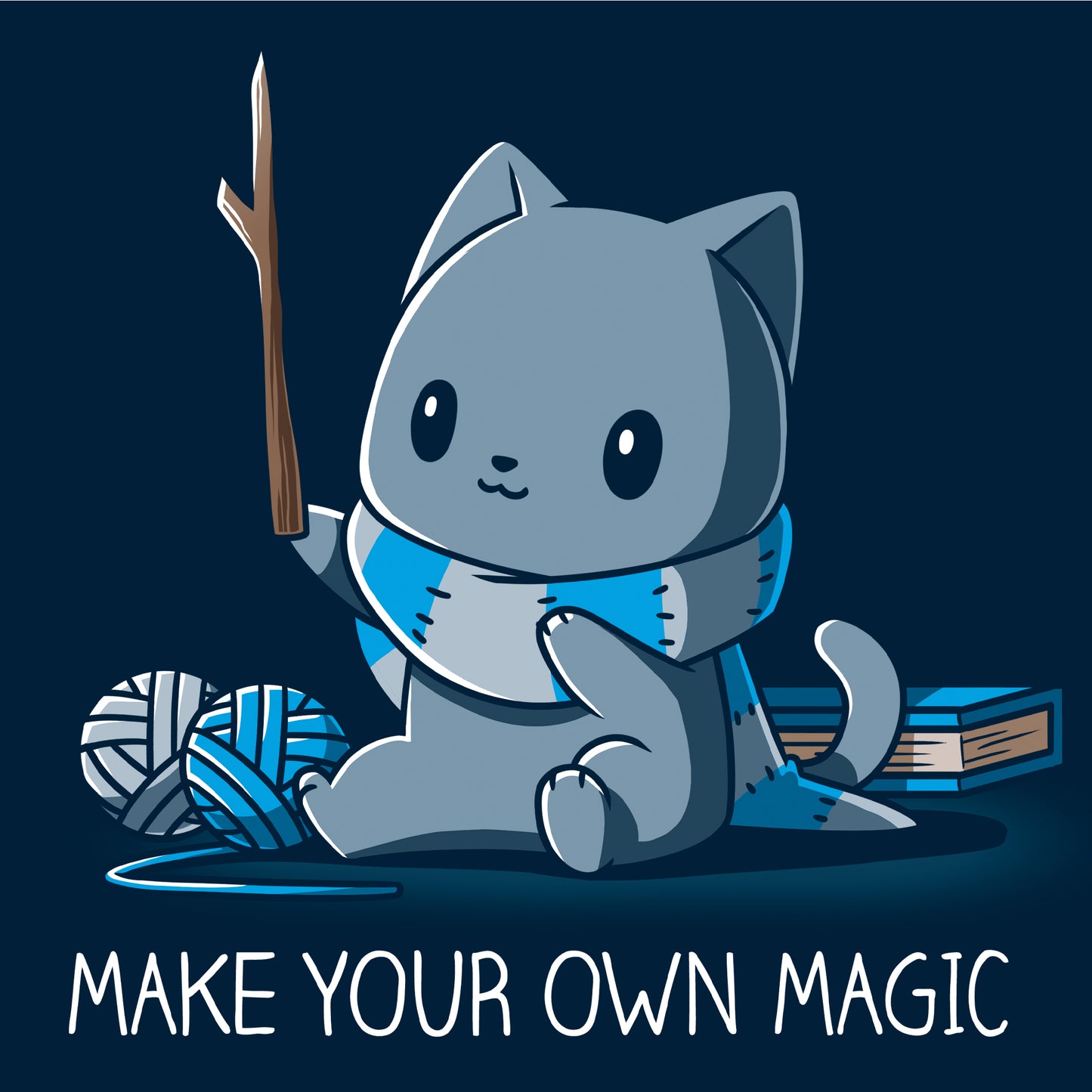 Pullover Hoodie_Teeturtle Make Your Own Magic Navy Blue Featuring a gray cat sitting in front of a book next to yarn with a wand-like stick and a crafted scarf with the text 'Make Your Own Magic' below.