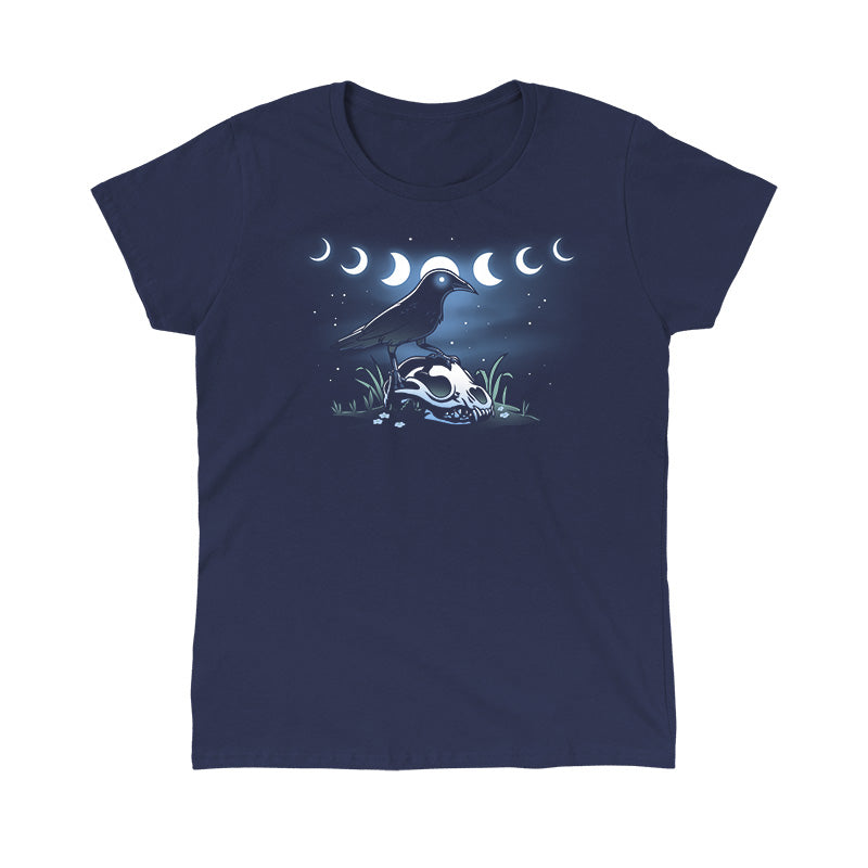 Classic Cotton T-shirt_TeeTurtle Mystical Crow navy blue t-shirt featuring a crow with glowing eyes standing on an animal skull in a grassy area under a night sky.