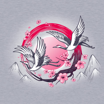 Classic Cotton T-shirt_TeeTurtle Red-Crowned Cranes heather gray t-shirt featuring an illustration of two cranes in flight with pink sakura blossoms, a red circular element, and stylized mountains in the background. 