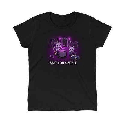 Classic Cotton T-shirt_TeeTurtle black Stay For A Spell apparel featuring two black cats in a spooky dungeon with one cat on a stool stirring a large cauldron, and the other cat reading from a pile of spell books with books, witchcraft accessories, and potion-making equipment in the background.