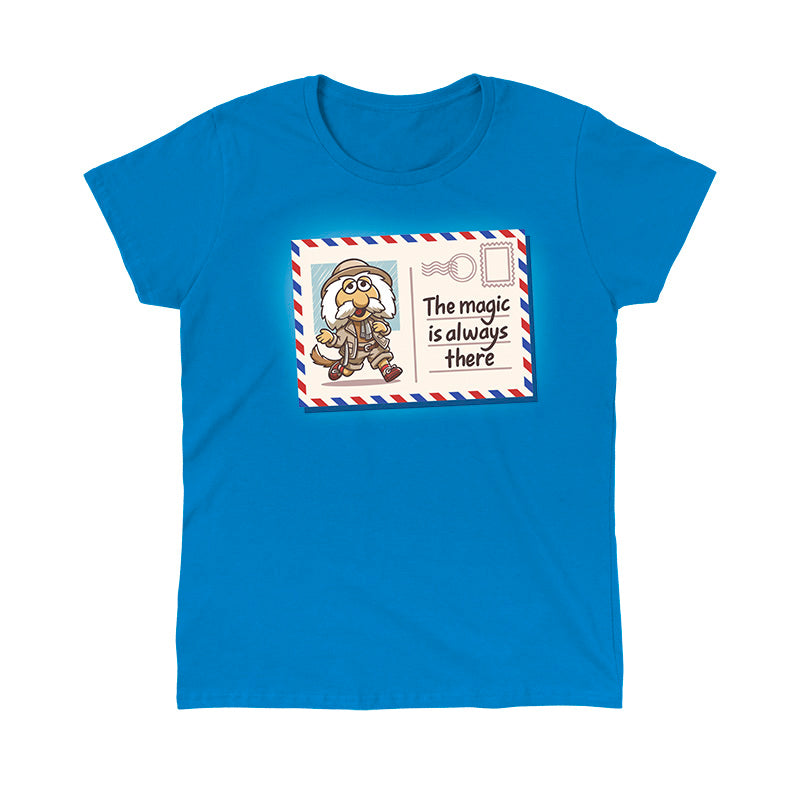 Classic Cotton T-shirt_TeeTurtle sapphire blue The Magic Is Always There apparel featuring Uncle Traveling Matt on a mail postcard with the caption on the underneath the stamp, “The Magic Is Always There“.