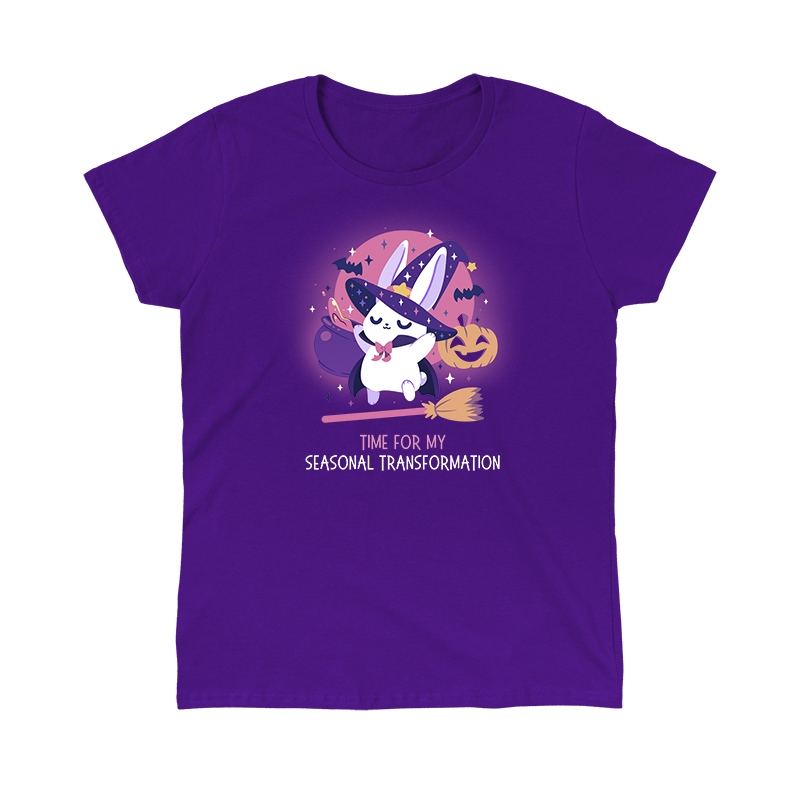 Classic Cotton T-shirt_TeeTurtle purple Time For My Seasonal Transformation apparel featuring a white bunny wearing a sparkling purple witch hat and cloak on top of a flying broom with a cauldron, bats, jack-o'-lantern, and the full red moon in the background.