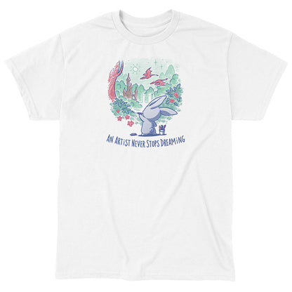 Classic Cotton T-shirt_TeeTurtle An Artist Never Stops Dreaming white t-shirt featuring a bunny painting a whimsical landscape with a castle, trees, and flying creature.