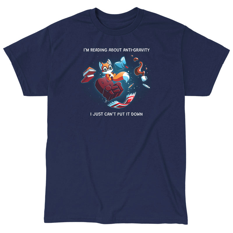 Classic Cotton T-shirt_TeeTurtle navy blue Anti-Gravity Enthusiast apparel featuring a fox wearing glasses reading a book with floating in mid-air with its living room furniture, such as a chair, rug, and lamp, with the caption, “I’m Reading About Anti-Gravity, I Just Can’t Put It Down“.