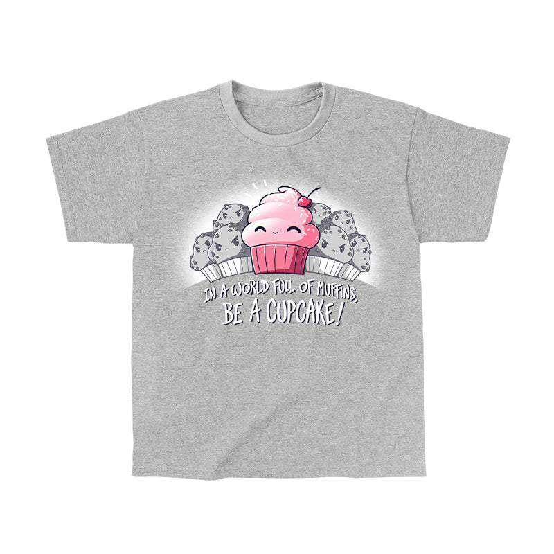 Classic Cotton T-shirt_TeeTurtle Be a Cupcake heather gray t-shirt featuring a cheerful pink cartoon cupcake with a cherry on top smiling among angry muffins, captioned "In a world full of muffins, be a cupcake!" in this food design.