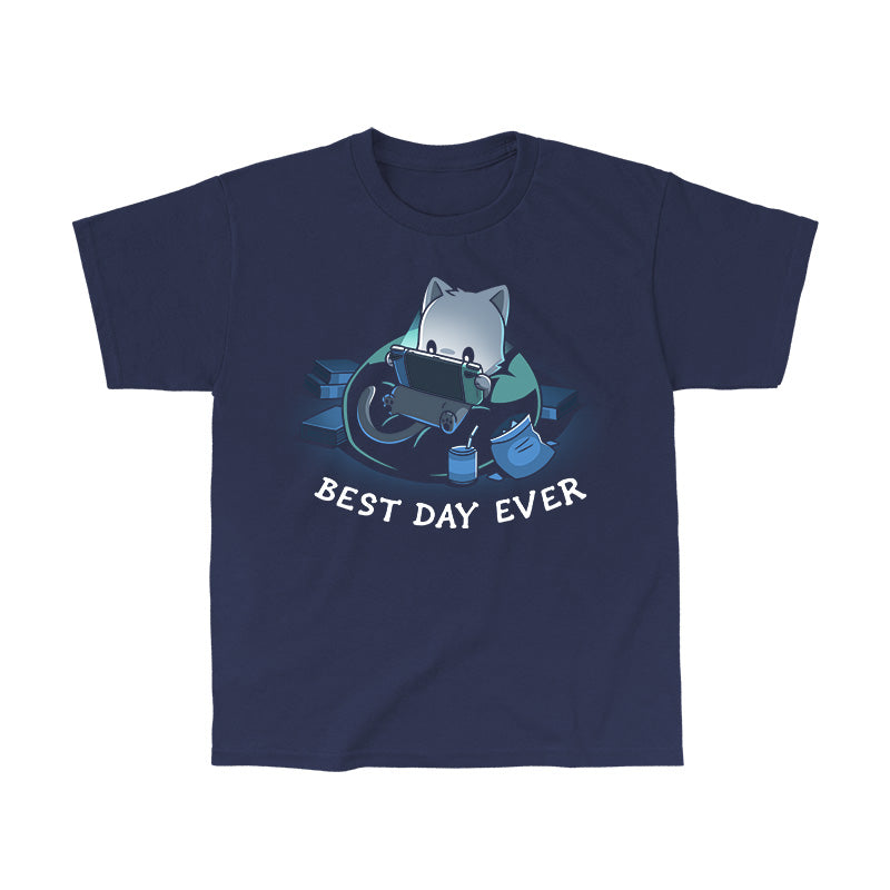 Classic Cotton T-shirt_TeeTurtle Best Day Ever navy blue t-shirt featuring an illustration of a cat sitting on a bean bag chair playing a portal video game surrounded by a mess of books and an open bag of chips and a can of soda with a straw. "BEST DAY EVER" is written underneath.