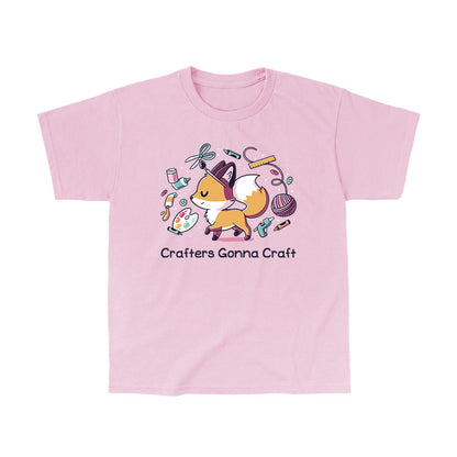 Classic Cotton T-shirt_TeeTurtle light pink Crafters Gonna Craft apparel featuring happy fox surrounded by crafting items such as paint, scissors, yarn, and glue. Caption below reads, "Crafters Gonna Craft".