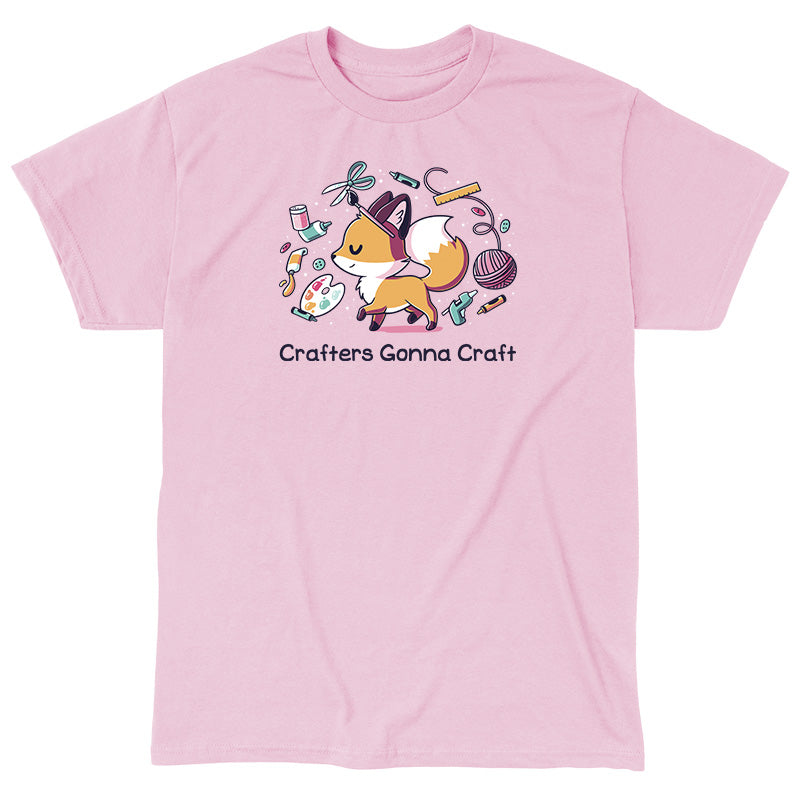 Classic Cotton T-shirt_TeeTurtle light pink Crafters Gonna Craft apparel featuring happy fox surrounded by crafting items such as paint, scissors, yarn, and glue. Caption below reads, "Crafters Gonna Craft".