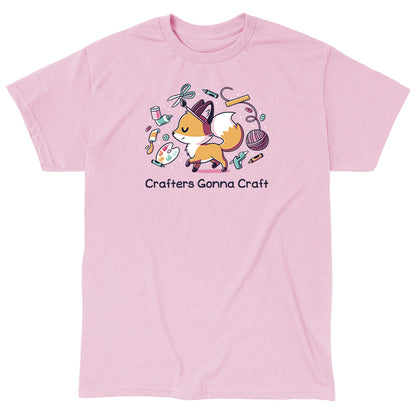 Classic Cotton T-shirt_TeeTurtle light pink Crafters Gonna Craft apparel featuring happy fox surrounded by crafting items such as paint, scissors, yarn, and glue. Caption below reads, "Crafters Gonna Craft".