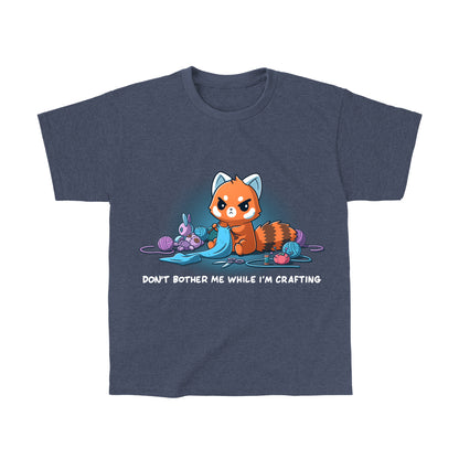 Classic Cotton T-shirt_TeeTurtle heather navy Don't Bother Me While I'm Crafting featuring an introverted, knitting red panda surrounded by knitting materials.