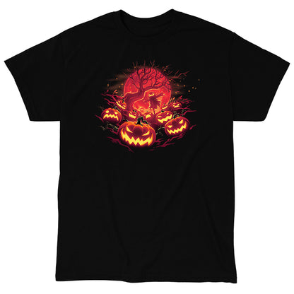 Classic Cotton T-shirt_TeeTurtle Haunted Pumpkin Patch black t-shirt featuring an illustration of glowing, orange-red jack-o-lanterns that show various expressions, such as mischievous grins and sinister scowls that surround a barren skeletal tree that reaches up out from the fiery full moon's edge.  A scarecrow with a jack-o-lantern head stands in the center of the image below the branches amongst the pumpkins.