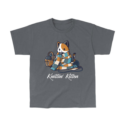 Classic Cotton T-shirt_TeeTurtle Knittin' Kitten charcoal gray t-shirt featuring a calico cat knitting a long scarf that’s wrapped around it with a basket of yarn next to it.