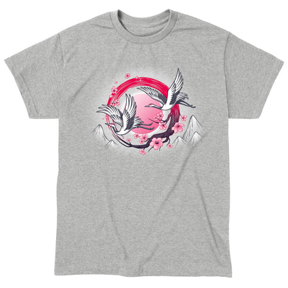 Classic Cotton T-shirt_TeeTurtle Red-Crowned Cranes heather gray t-shirt featuring an illustration of two cranes in flight with pink sakura blossoms, a red circular element, and stylized mountains in the background. 