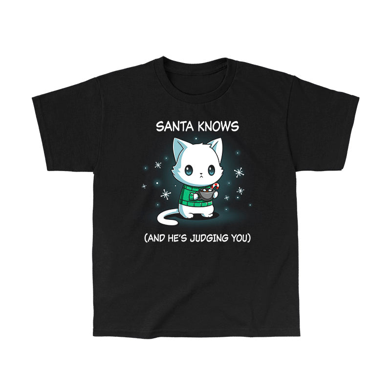 Classic Cotton T-shirt_TeeTurtle black Santa Knows apparel featuring a cat with a deadpan expression holding mug with hot chocolate, marshmallows, and a candy cane surrounded by snowflakes, with the caption, “Santa Knows (And He’s Judging You)“.