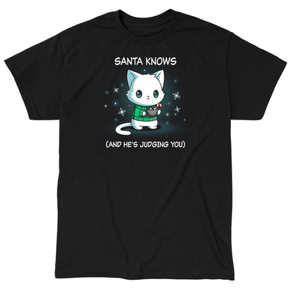 Classic Cotton T-shirt_TeeTurtle black Santa Knows apparel featuring a cat with a deadpan expression holding mug with hot chocolate, marshmallows, and a candy cane surrounded by snowflakes, with the caption, “Santa Knows (And He’s Judging You)“.