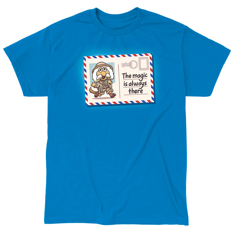 Classic Cotton T-shirt_TeeTurtle sapphire blue The Magic Is Always There apparel featuring Uncle Traveling Matt on a mail postcard with the caption on the underneath the stamp, “The Magic Is Always There“.