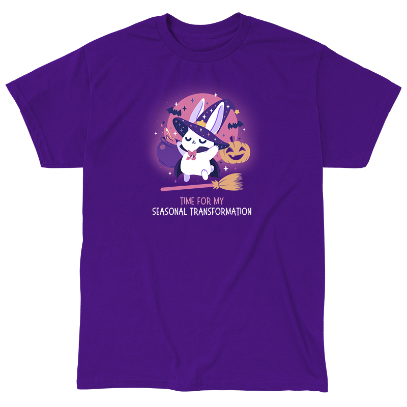 Classic Cotton T-shirt_TeeTurtle purple Time For My Seasonal Transformation apparel featuring a white bunny wearing a sparkling purple witch hat and cloak on top of a flying broom with a cauldron, bats, jack-o'-lantern, and the full red moon in the background.