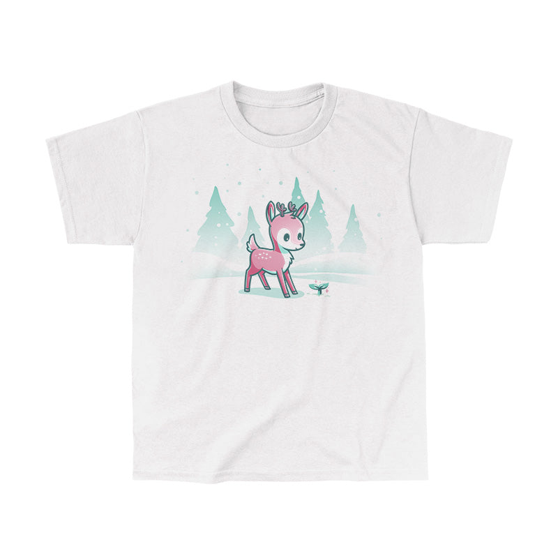 Classic Cotton T-shirt_TeeTurtle Winter Wonderland White t-shirt featuring a cartoon deer with small antlers stands in a snowy landscape with evergreen trees, looking curiously at a glowing sprout on the ground. Snowflakes are falling around them. 