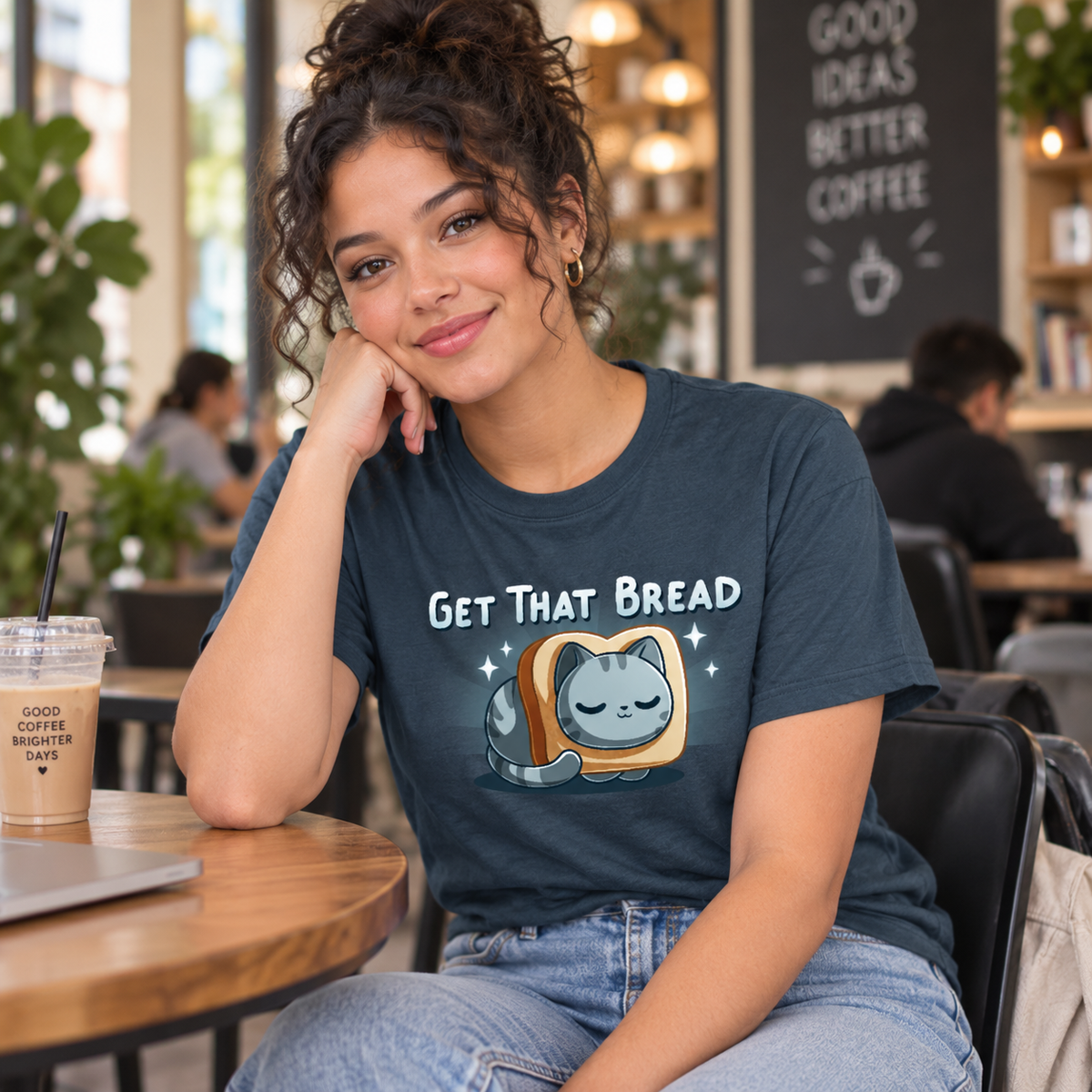 Women's Premium T-Shirt_TeeTurtle dark teal Get That Bread Women's Premium T-Shirt featuring a cozy gray tabby cat curled up inside a slice of toast with sparkles around it and the text "Get That Bread."