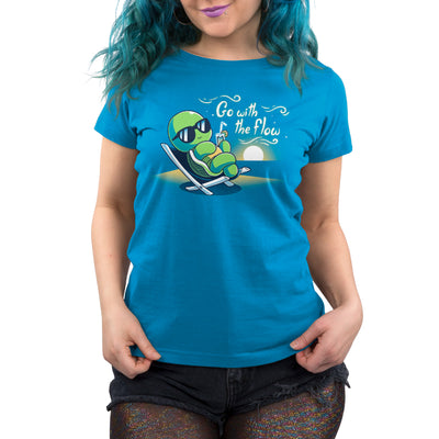 Premium Cotton T-shirt_Teeturtle cobalt blue Go with the Flow apparel featuring a turtle lounging on a beach chair with a tropical drink and sunglasses as the sun sets in the distance with the words 'Go with the Flow' to one side.