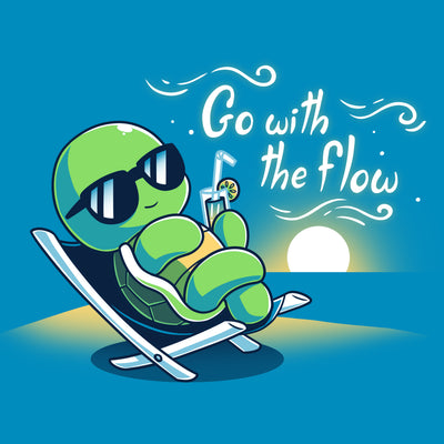 Premium Cotton T-shirt_Teeturtle cobalt blue Go with the Flow apparel featuring a turtle lounging on a beach chair with a tropical drink and sunglasses as the sun sets in the distance with the words 'Go with the Flow' to one side.