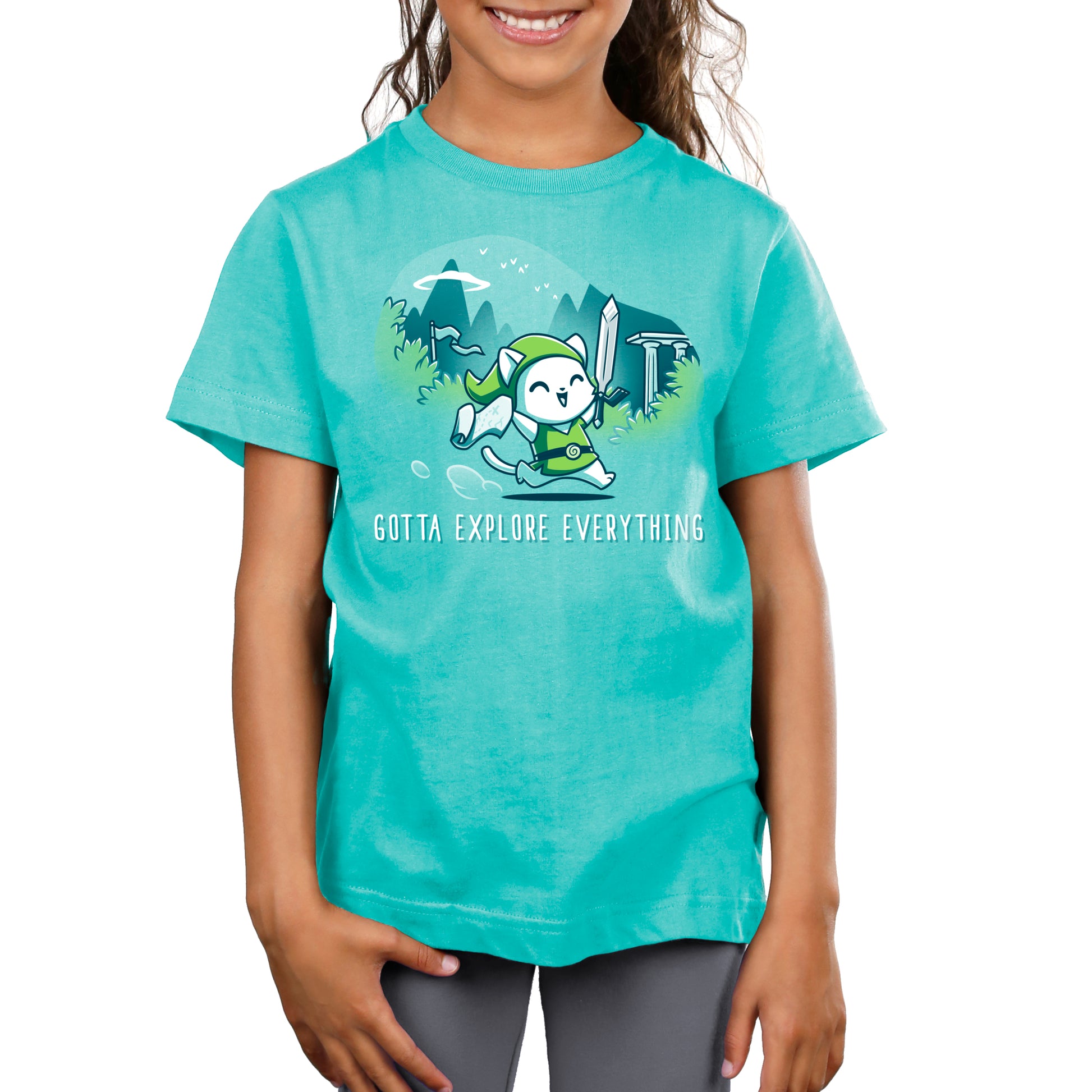 A young girl wearing a TeeTurtle "Gotta Explore Everything" t-shirt that says "save your world.