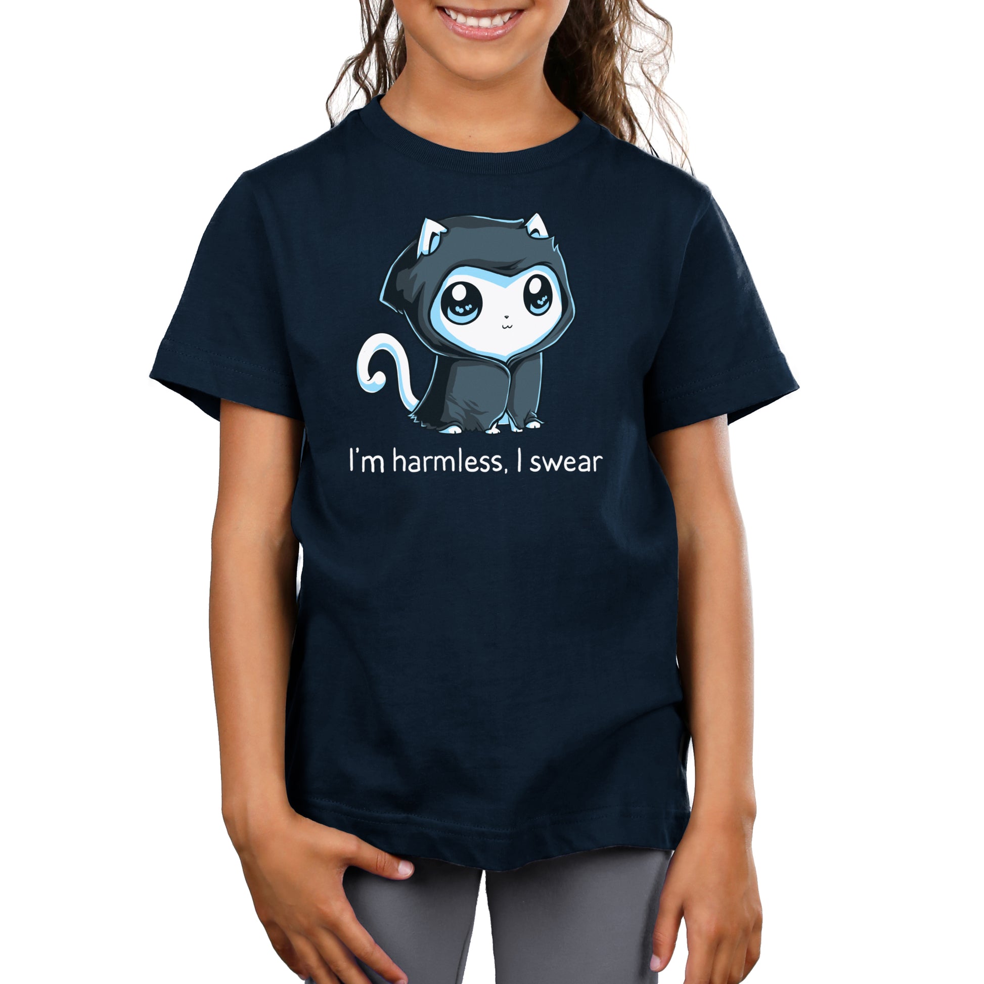 A girl wearing a navy blue Grim Kitty (Glow) t-shirt from TeeTurtle that says i'm a harbinger.
