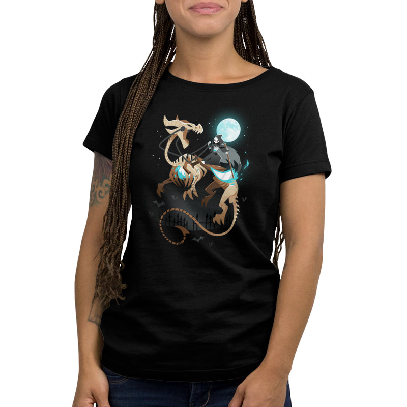 A woman wearing a black Grim Knight T-shirt featuring a dragon on a full moon night.