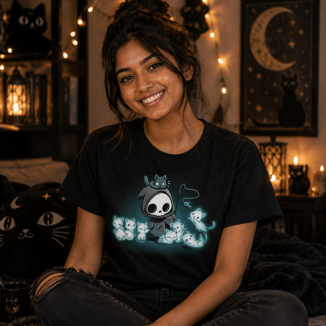 Women's Premium T-Shirt_TeeTurtle black Grim and Kitties Women's Premium T-Shirt featuring a cute grim reaper surrounded by glowing ghostly cats, with a black cat perched on its hood and a dangling cat toy in hand.