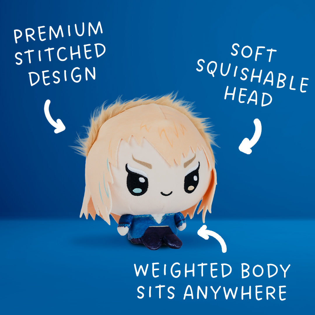 Jareth the Goblin King in Cloudheads plushie form. He has a tiny body, big head and his trademark dramatic hair and intense heterochromatic eyes. The image is marked up with the phrases "premium stitched design," "soft squishable head" and "weighted body sits anywhere." 