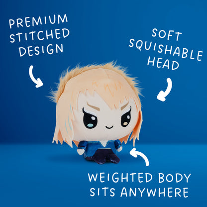 Jareth the Goblin King in Cloudheads plushie form. He has a tiny body, big head and his trademark dramatic hair and intense heterochromatic eyes. The image is marked up with the phrases "premium stitched design," "soft squishable head" and "weighted body sits anywhere." 