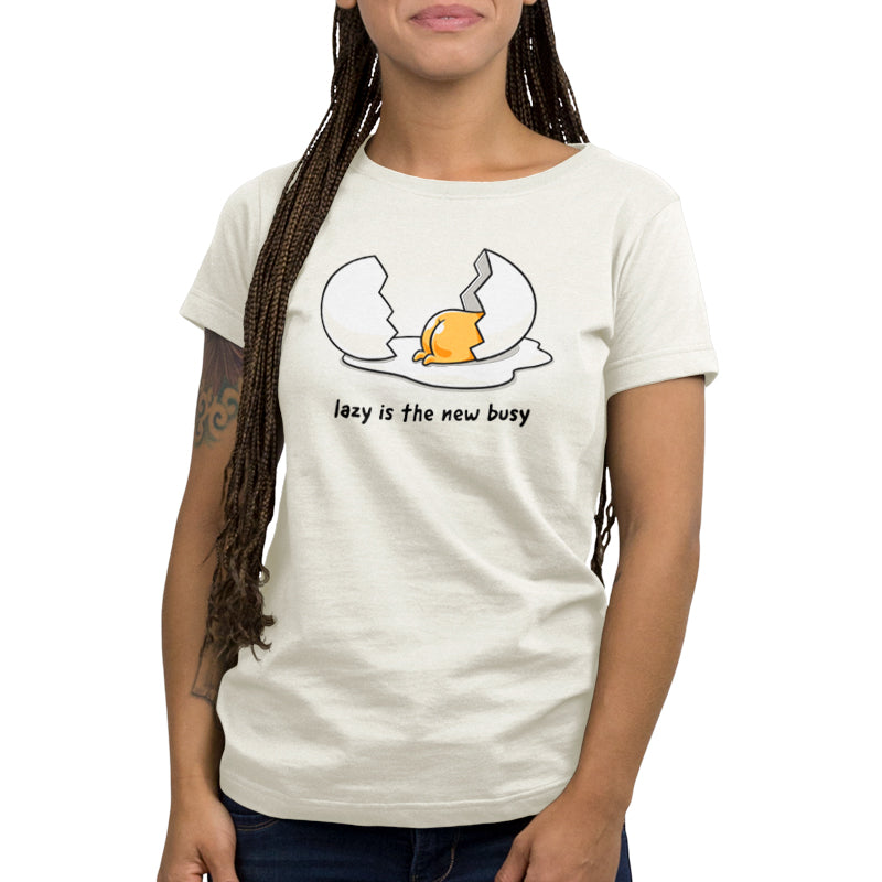 A woman wearing an officially licensed Gudetama "Lazy is the New Busy" T-shirt.