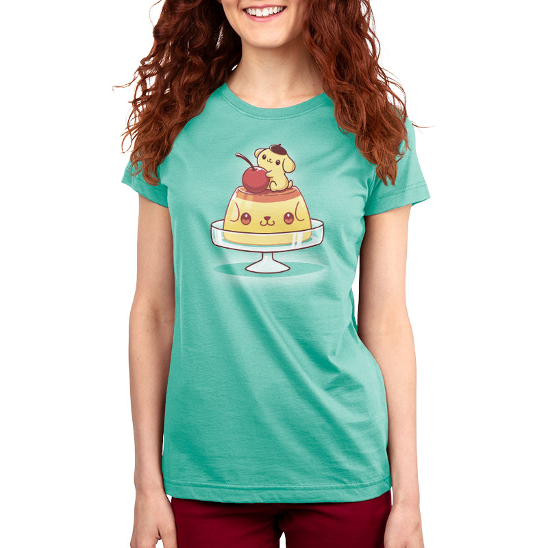 A women's t-shirt with Pompompurin's Pudding, by Sanrio, on top of a cake.