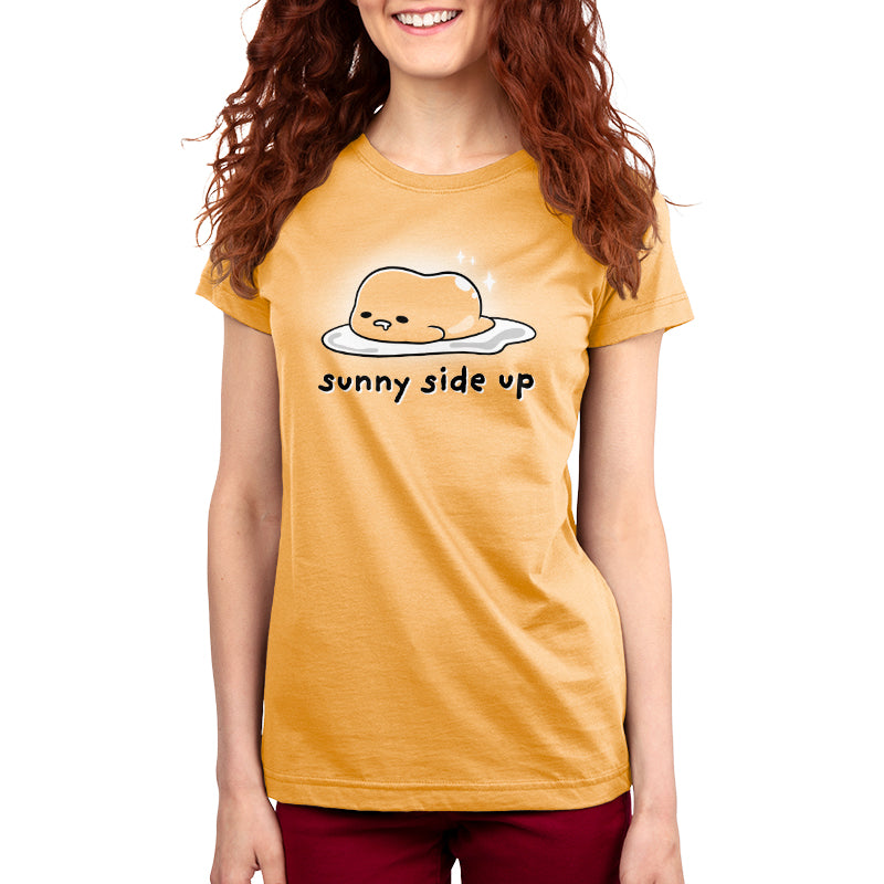 A woman wearing an officially licensed Gudetama Sunny Side Up lounging t-shirt.