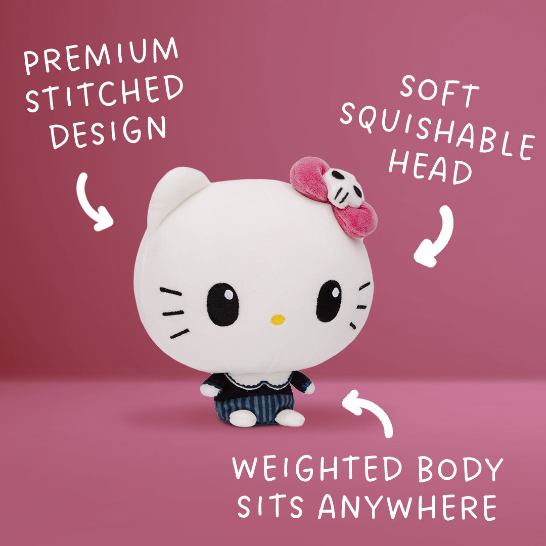 A Hello Kitty Cloudheads plushie with a large white head, black eyes, a pink bow with a skull detail, and a navy-and-white striped outfit with a fancy collar on a pink background with the text "premium stitched design," "soft squishable head," and "weighted body sits anywhere"
