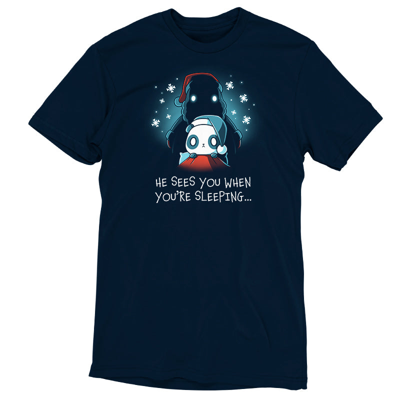 A navy blue t-shirt from TeeTurtle called "He Sees You When You're Sleeping.