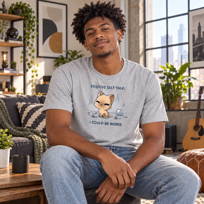 Men's Premium T-Shirt_TeeTurtle light gray I Could Be Worse Men's Premium T-Shirt featuring a content orange cat sitting beside a shattered vase with the text "Positive Self Talk: I Could Be Worse."