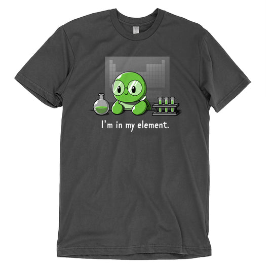 Charcoal gray t-shirt featuring a cartoon green character in a lab with test tubes and a flask. The text reads, 