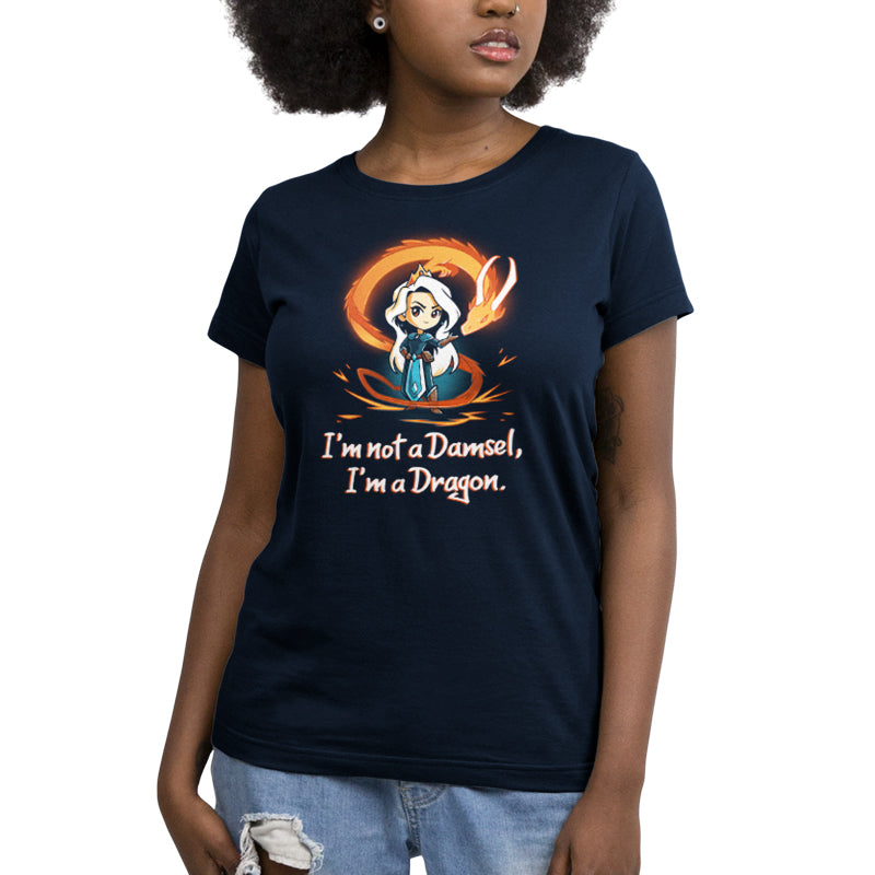 A woman wearing a Navy Blue TeeTurtle T-shirt that says, "I'm Not a Damsel, I'm a Dragon.