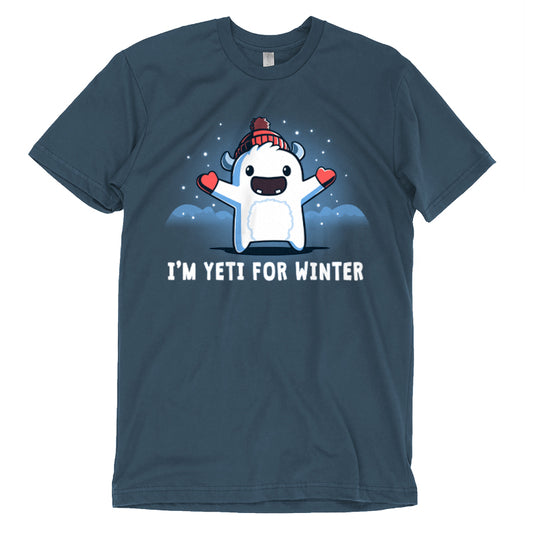 Premium Cotton T-shirt_Teeturtle I'm Yeti for Winter denim t-shirt featuring a happy Yeti in the snowy winter mountains wearing a pom-pom winter hat and mittens.