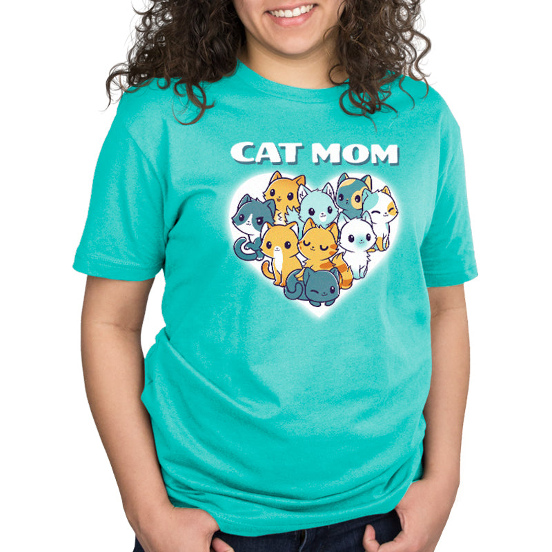 A girl wearing a TeeTurtle Caribbean Blue t-shirt that says I'm a Cat Mom.