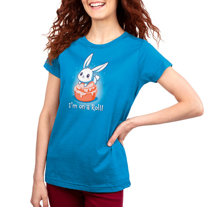 A woman wearing an I'm On a Cinnamon Roll t-shirt from TeeTurtle.