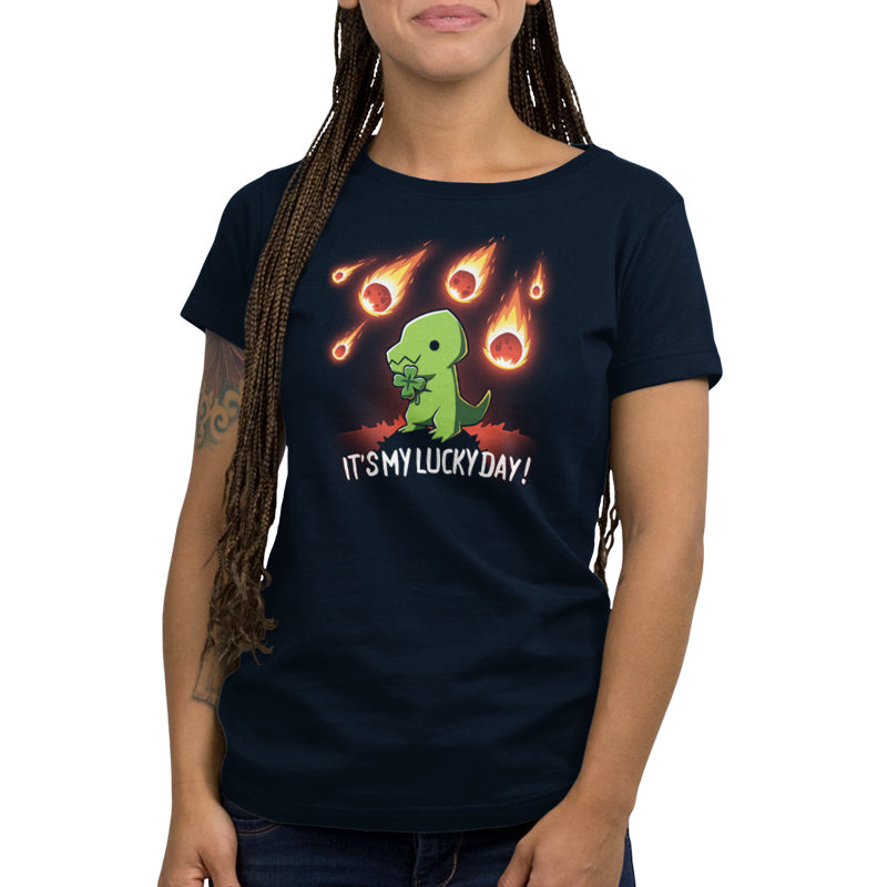 A woman wearing a TeeTurtle women's t-shirt with the words "exploding" and It's My Lucky Day charms.