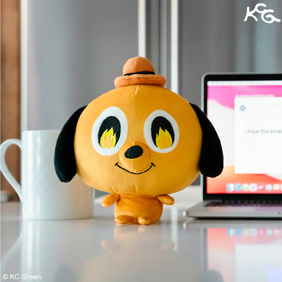 Cloudheads: 5" Question Hound sitting on a desk with a coffee mug and laptop in the background